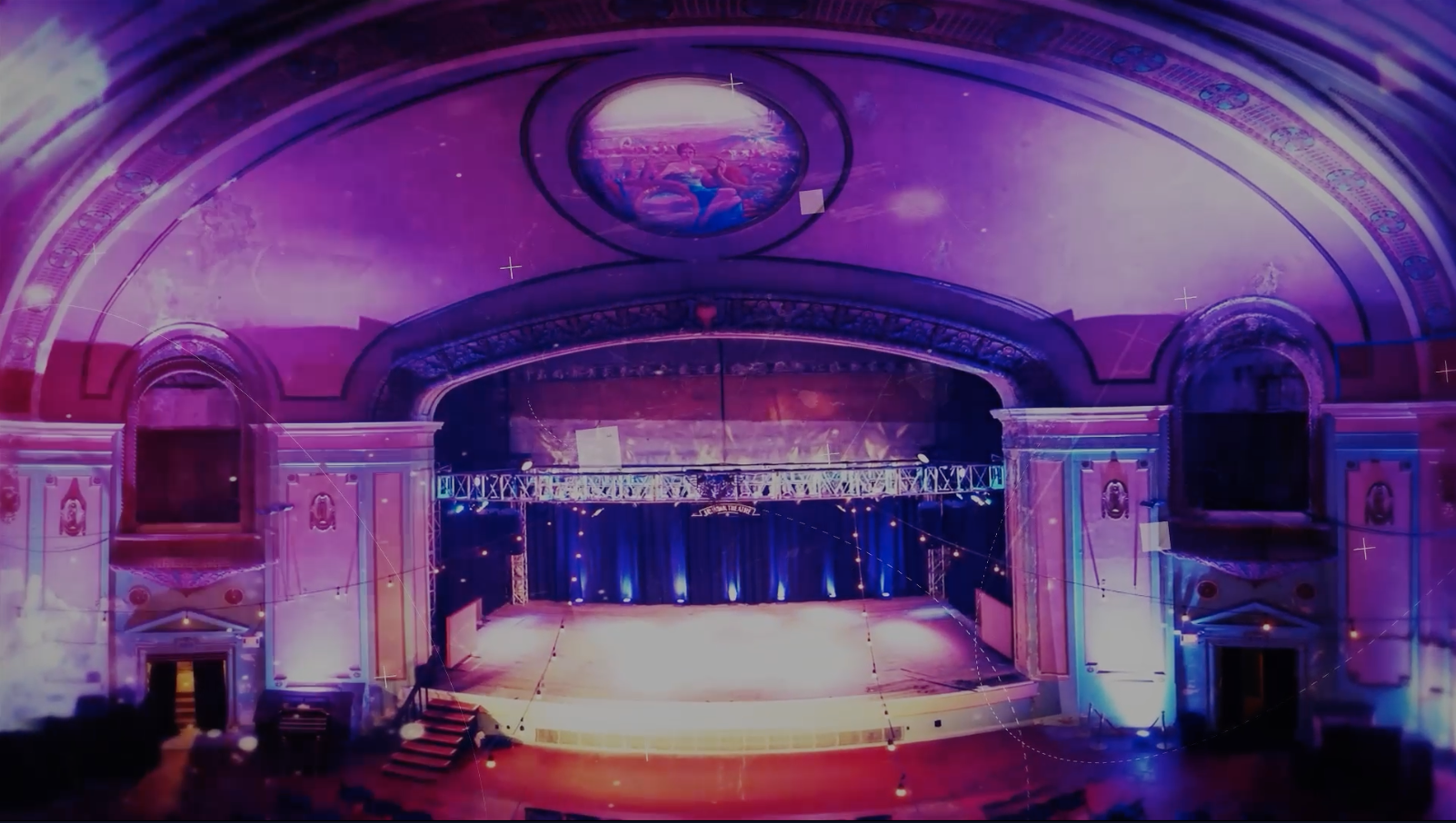 Topeka, Kansas Jayhawk Theatre interior with stage lighting during a cinematic fundraising video in Topeka.